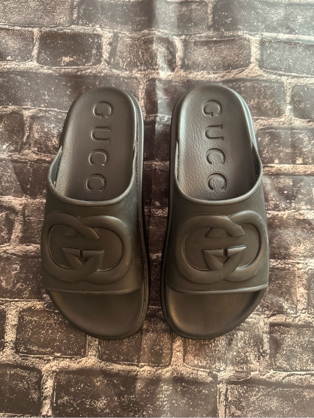 Gucci Black Embossed Logo Leather Slide